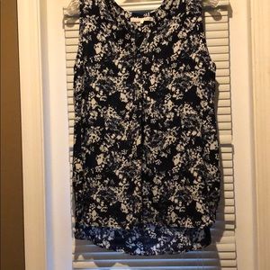 Sheer tank top with blue and white floral design